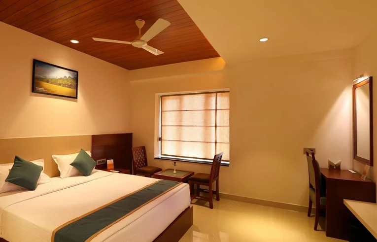 Blossom Deluxe Room interior - Affordable Family Hotels in Wayanad